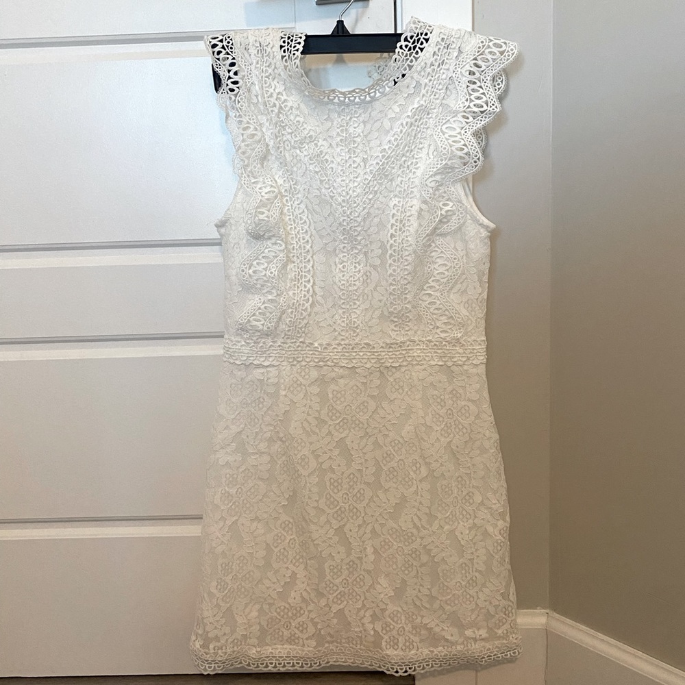 White lulus A-line lace dress. Runs short, best on girls 5.3 for and under. XS